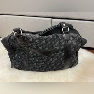 TNA overnight duffle bag in black and silver